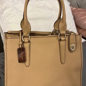 Tan coach purse